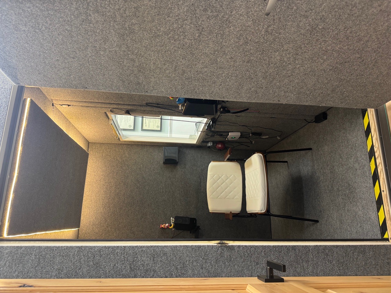 Inside the sound-treated hearing test booth